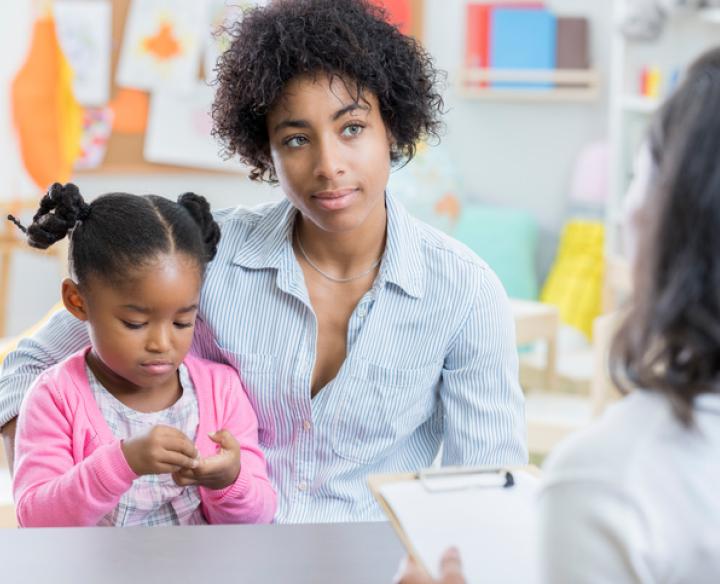 Teacher and Parent Having a Conversation